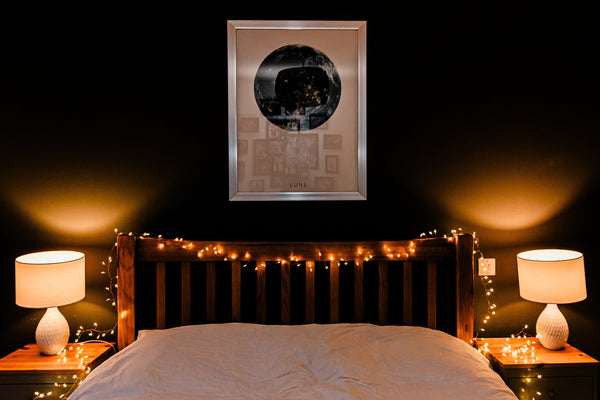 Bedroom fairy lights on bed head