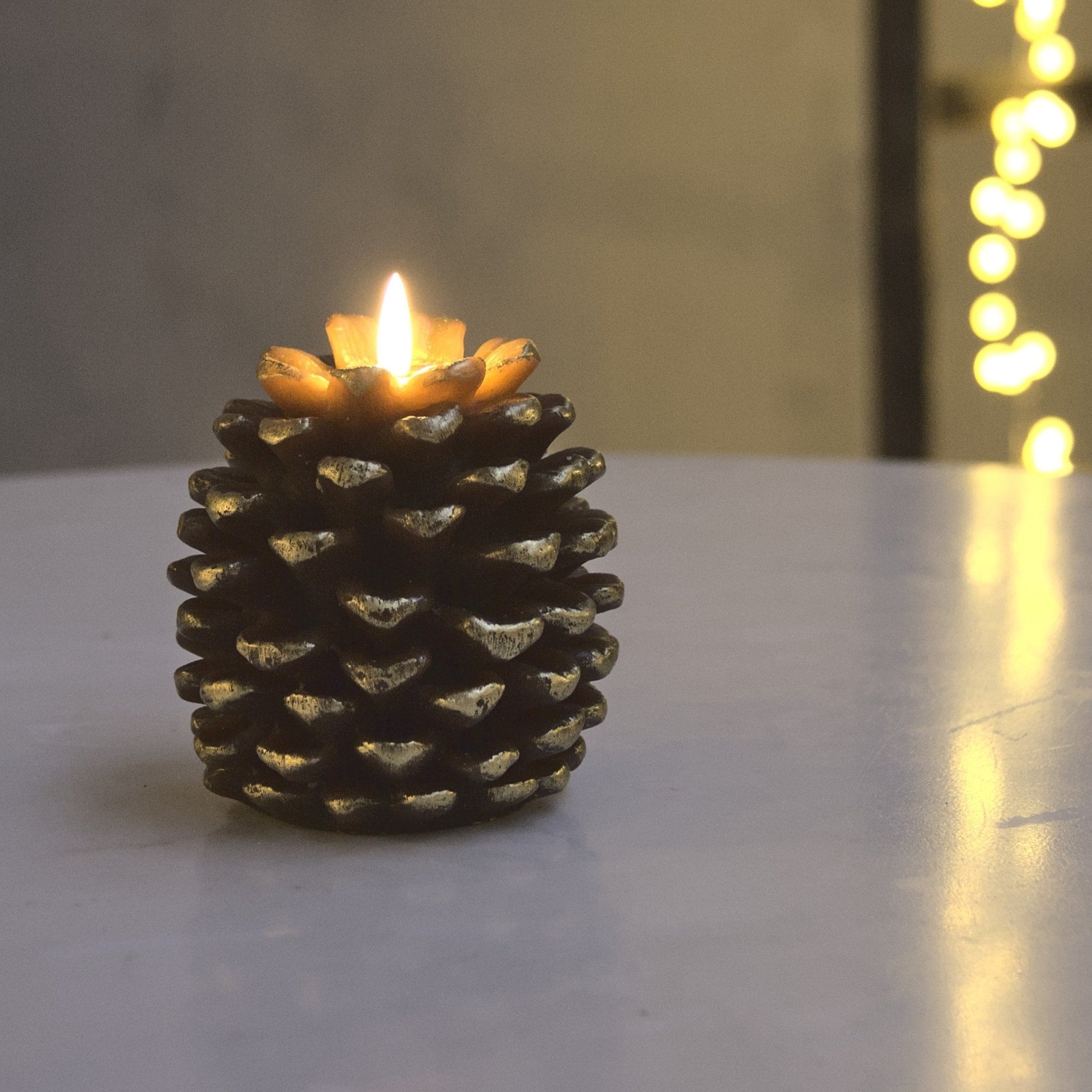 Gold Pine Cone Candles - sparkle.lighting