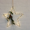 black Star Light hanging with festive decoration 