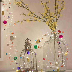 Boho fairy lights with colourful beads, stars and holographic discs - sparkle.lighting