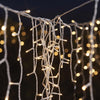Falling Snow Icicle Lights - sparkle.lighting