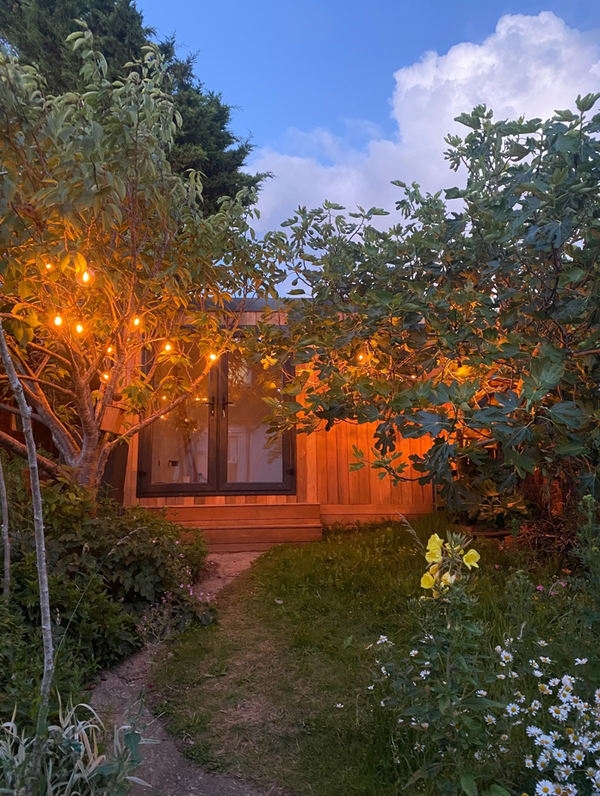 globe festoon lights near garden room